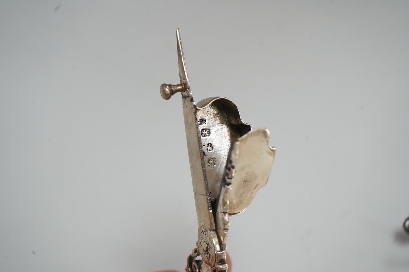 A pair late George II silver candle snuffers and similar stand, stand WC?, London, 1769, 18.5cm, snuffers I.B, London, 1769, 9oz.